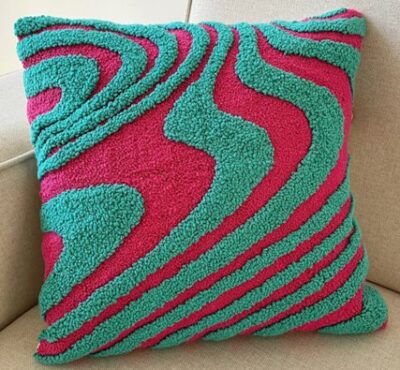 green red woven cushion